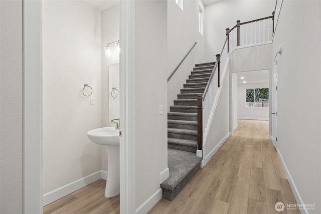 20424 E 97th Ave E Unit 6, Graham, WA 98338 - stairway with wood finished floors and a high ceiling