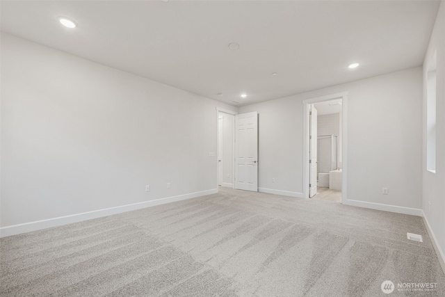 20424 E 97th Ave E Unit 6, Graham, WA 98338 - unfurnished bedroom with recessed lighting, light colored carpet, and ensuite bath