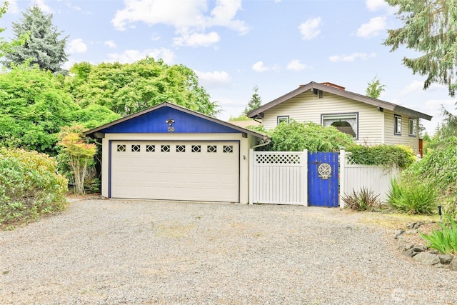 50 Hemlock Way, Sequim, WA 98382 - view of front of property with a gate, a detached garage, and gravel driveway