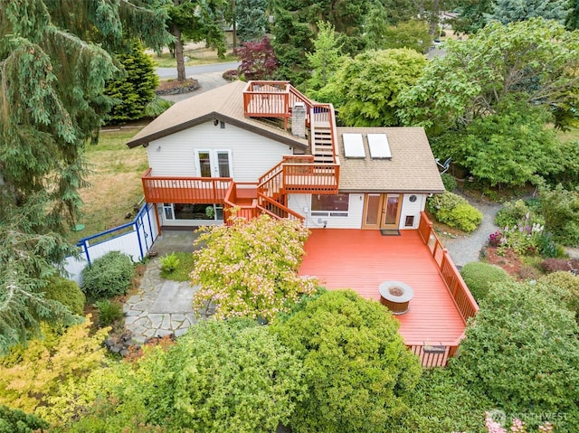 50 Hemlock Way, Sequim, WA 98382 - rear view of property with stairway, a deck, and roof with shingles