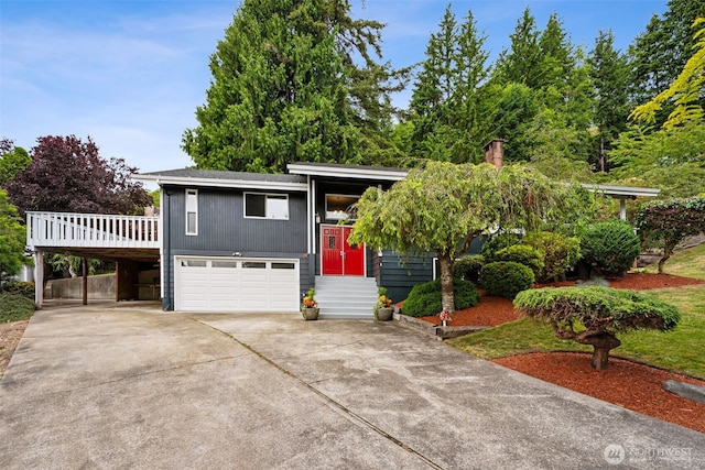 933 N Stephenson, Montesano, WA 98563 - view of front of property featuring a garage, concrete driveway, a deck, and a carport