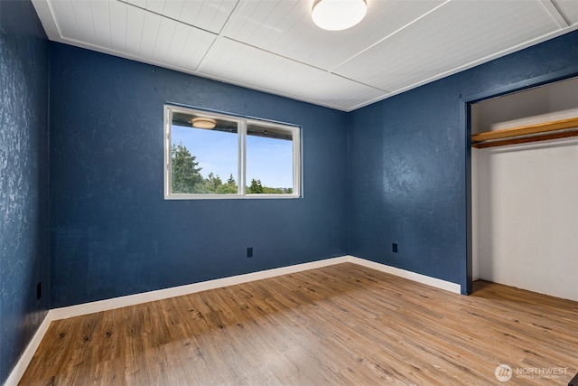 933 N Stephenson, Montesano, WA 98563 - unfurnished bedroom with wood finished floors, a closet, and wood ceiling