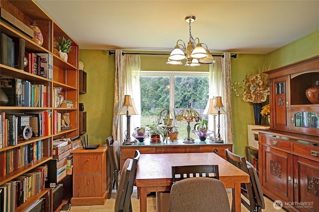 657 SW Camano Dr, Camano Island, WA 98282 - dining space featuring a chandelier and light tile patterned floors