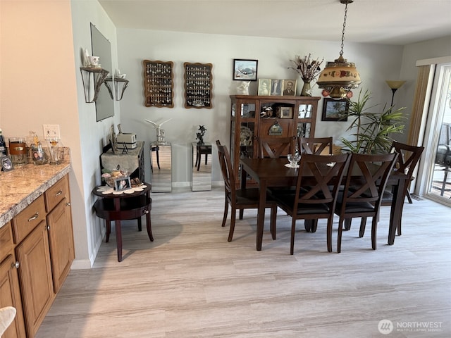 2748 SW 327th St S, Federal Way, WA 98023 - dining area featuring light wood-style flooring and baseboards