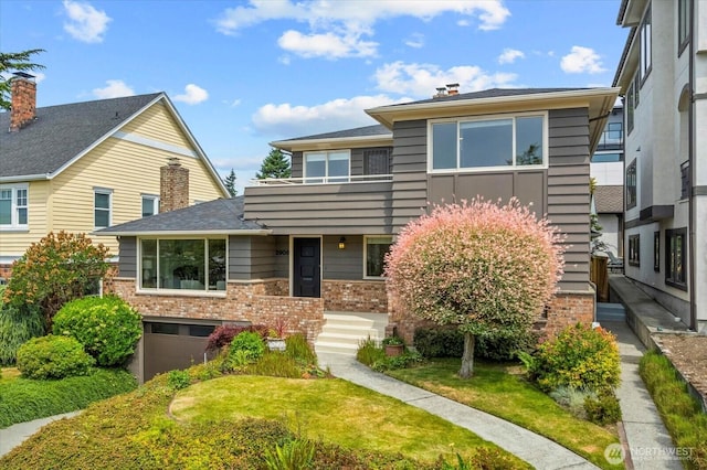 2906W Eaton St, Seattle, WA 98199 - multi unit property with brick siding, roof with shingles, and a chimney