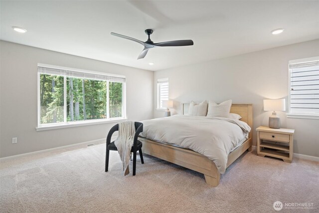 2405 NE Waterlily Way, Poulsbo, WA 98370 - carpeted bedroom featuring ceiling fan and recessed lighting