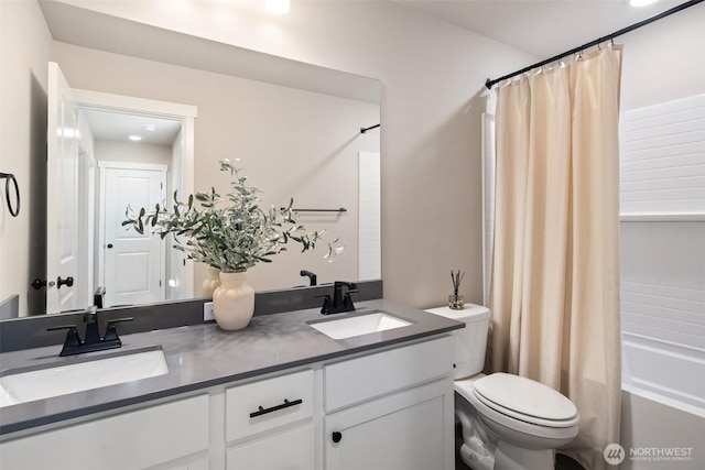 2405 NE Waterlily Way, Poulsbo, WA 98370 - bathroom featuring double vanity and shower / tub combo with curtain