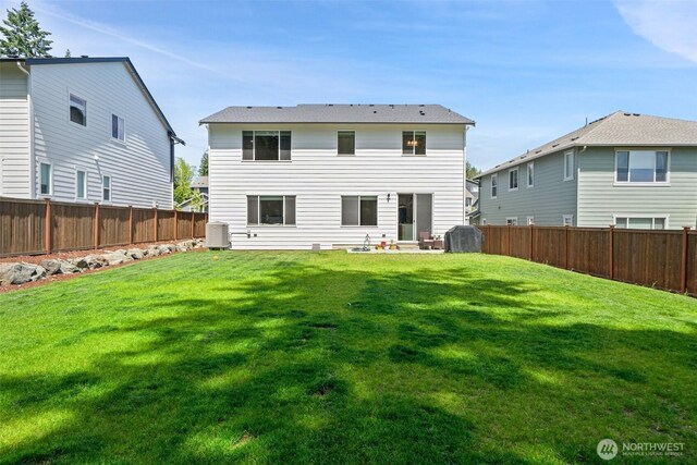 2405 NE Waterlily Way, Poulsbo, WA 98370 - rear view of property with a fenced backyard