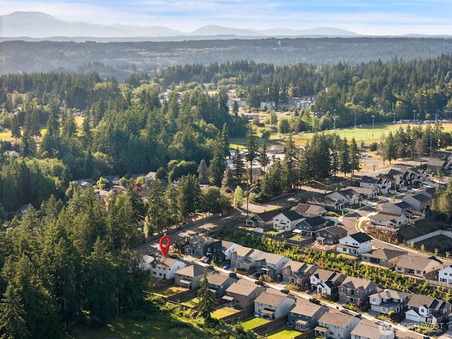 2405 NE Waterlily Way, Poulsbo, WA 98370 - aerial view of property and surrounding area featuring mountains