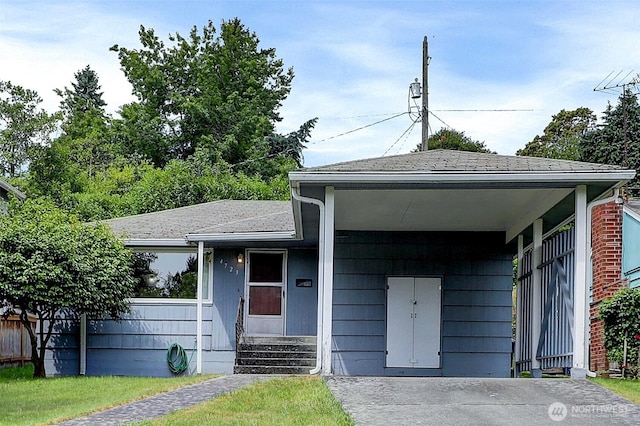 4723 50th Ave SW, Seattle, WA 98116 - view of front facade featuring a shingled roof