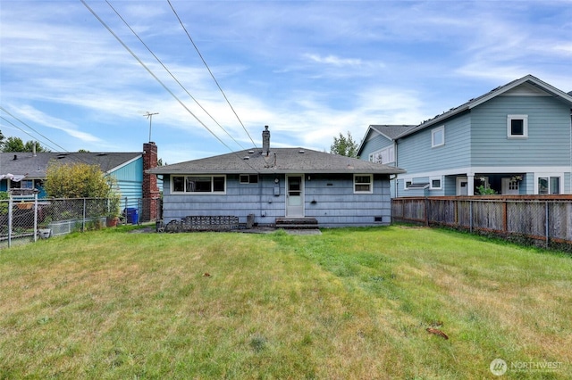 4723 50th Ave SW, Seattle, WA 98116 - back of property featuring a fenced backyard and entry steps