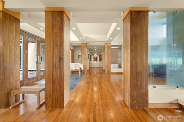 7215 Saint Andrews Ln SE, Snoqualmie, WA 98065 - hallway featuring wood finished floors, plenty of natural light, and recessed lighting