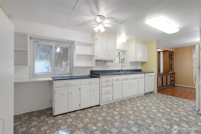 900 29th St SE Unit E-22, Auburn, WA 98002 - kitchen featuring white appliances, open shelves, dark countertops, white cabinetry, and ceiling fan