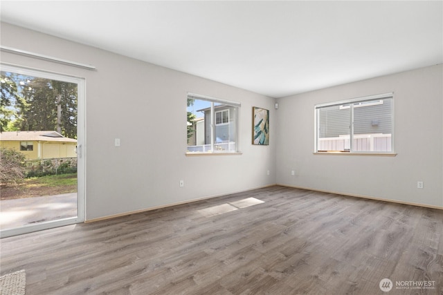 3615 Auburn Way S Unit B, Auburn, WA 98092 - empty room featuring wood finished floors