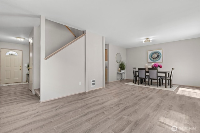 3615 Auburn Way S Unit B, Auburn, WA 98092 - dining area featuring wood finished floors and stairs