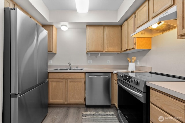 3615 Auburn Way S Unit B, Auburn, WA 98092 - kitchen featuring stainless steel appliances, under cabinet range hood, wood finished floors, and light countertops