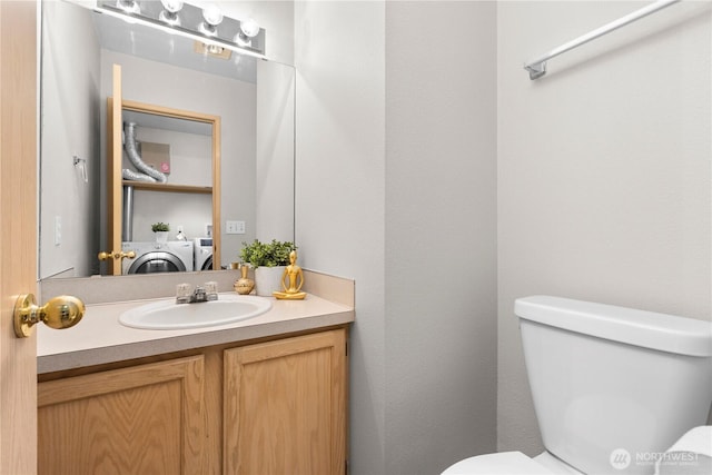 3615 Auburn Way S Unit B, Auburn, WA 98092 - bathroom featuring washing machine and clothes dryer and vanity