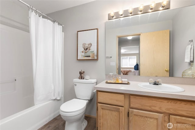 3615 Auburn Way S Unit B, Auburn, WA 98092 - ensuite bathroom featuring vanity, wood finished floors, and shower / bathtub combination with curtain