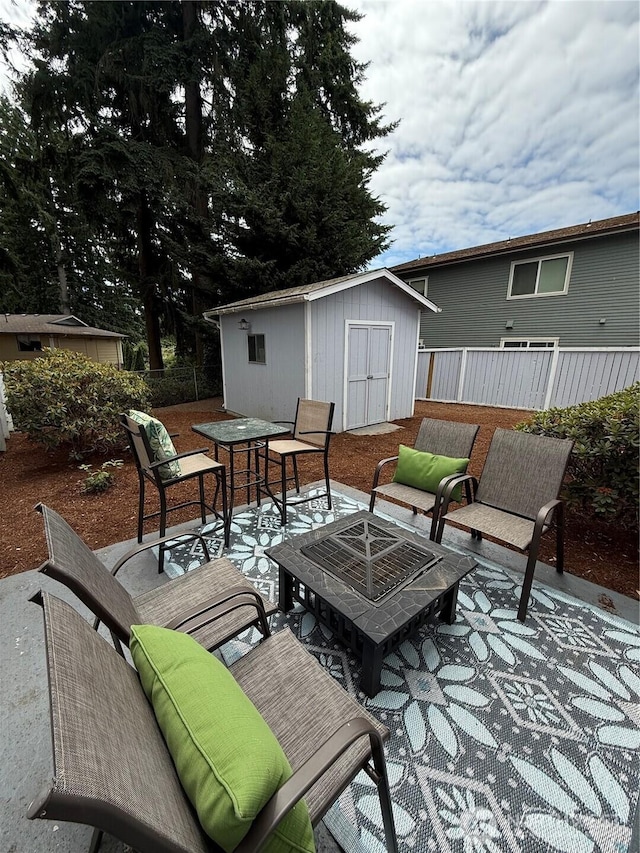 3615 Auburn Way S Unit B, Auburn, WA 98092 - view of patio featuring a storage shed and outdoor dining space