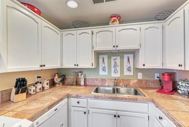 5118 NE 75th Ave, Vancouver, WA 98661 - kitchen featuring white dishwasher, white cabinets, tile counters, and recessed lighting