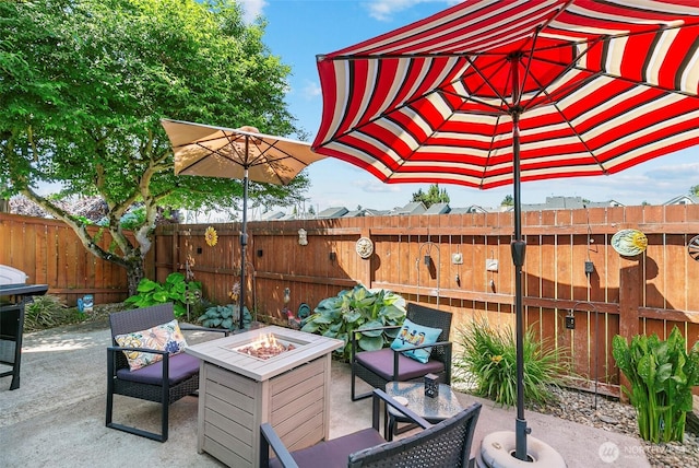 5118 NE 75th Ave, Vancouver, WA 98661 - fenced backyard with a fire pit and a patio area