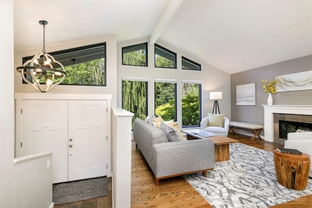 11520 3rd Ave NW, Seattle, WA 98177 - living room with a chandelier, wood finished floors, and a fireplace