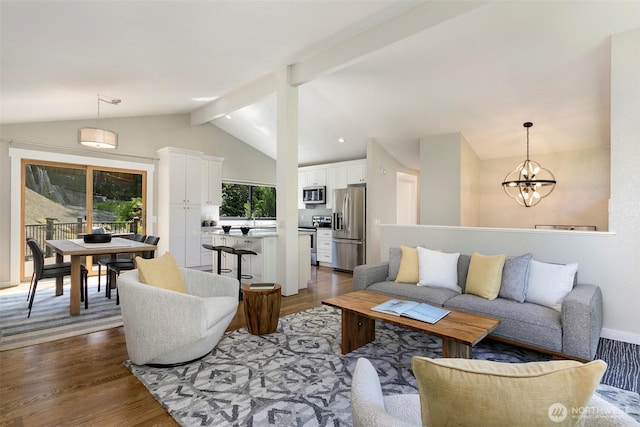 11520 3rd Ave NW, Seattle, WA 98177 - living area featuring dark wood finished floors and a chandelier