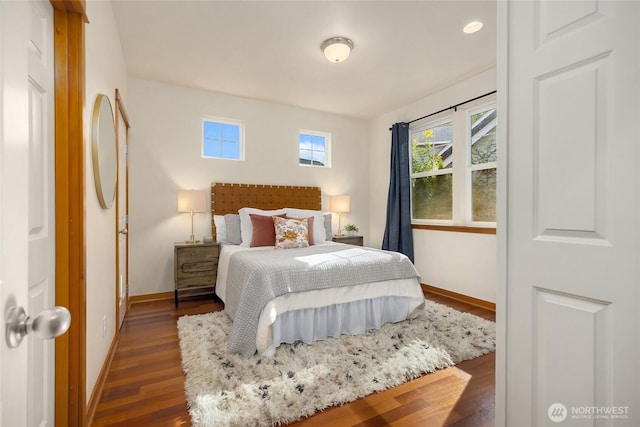 10290 NE Ruddy Duck Ln, Bainbridge Island, WA 98110 - bedroom featuring baseboards and wood finished floors