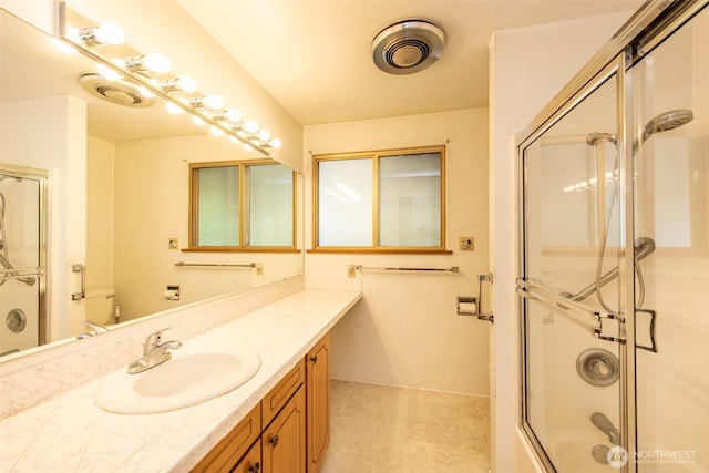 723 W 15th St, Port Angeles, WA 98363 - bathroom featuring vanity and enclosed tub / shower combo