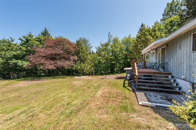 723 W 15th St, Port Angeles, WA 98363 - view of grassy yard featuring a wooden deck