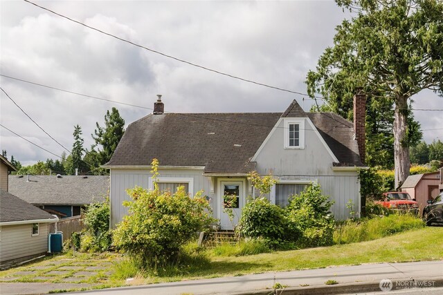 7936 E Main St, Port Orchard, WA 98366 - view of front facade with a chimney and a shingled roof