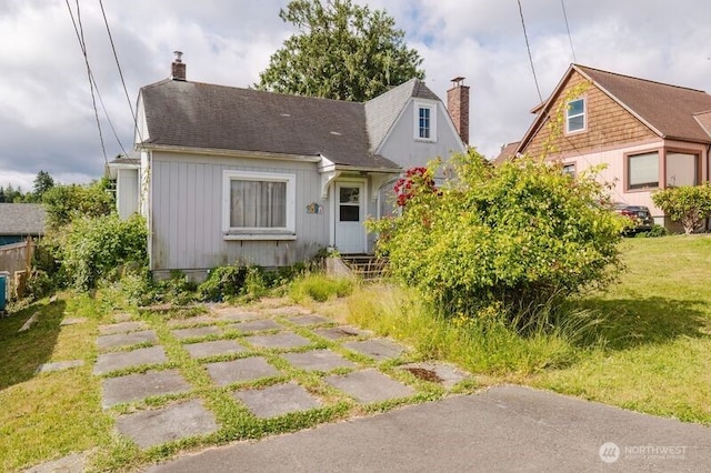 7936 E Main St, Port Orchard, WA 98366 - view of front of property with a chimney and roof with shingles