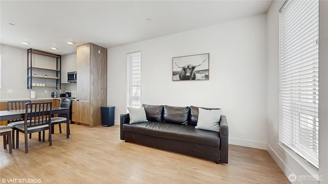 1300 E Remington Ct Unit A, Seattle, WA 98122 - living room with light wood finished floors and recessed lighting