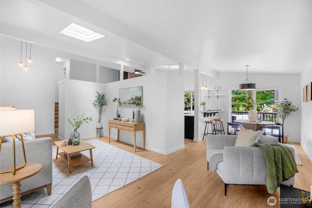 20201 45th Dr SE, Bothell, WA 98012 - living room featuring vaulted ceiling and light wood-style floors
