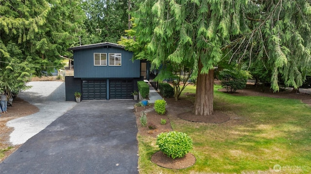 20201 45th Dr SE, Bothell, WA 98012 - view of front facade featuring asphalt driveway, a garage, and a front lawn