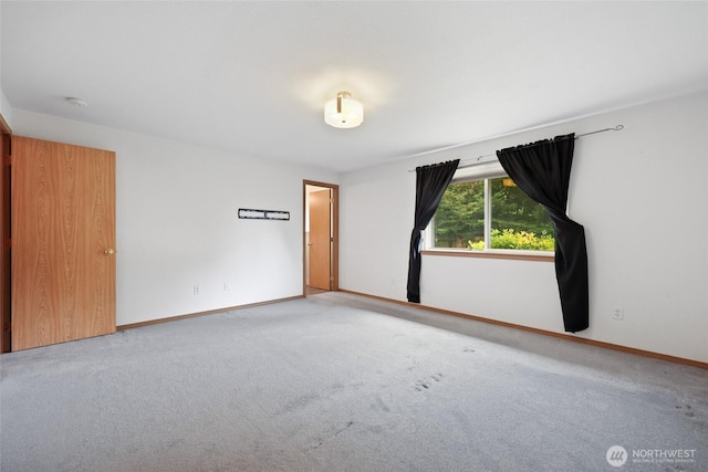 421 E Marion St, Aberdeen, WA 98520 - carpeted empty room featuring baseboards