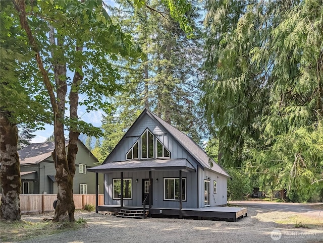 129 Slalom Way, Packwood, WA 98361 - view of front facade featuring board and batten siding, a porch, and roof with shingles