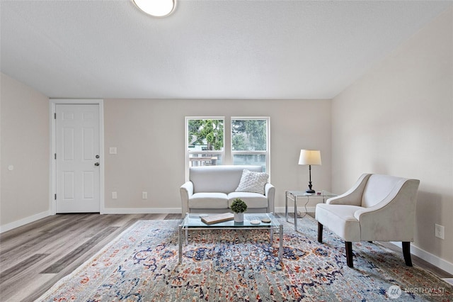 1320 N Oak Harbor St Unit 1, Oak Harbor, WA 98277 - living area with wood finished floors and baseboards