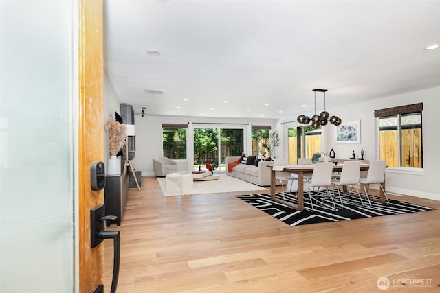 18114 NE 23rd St, Redmond, WA 98052 - dining space featuring light wood-style floors, recessed lighting, and a chandelier