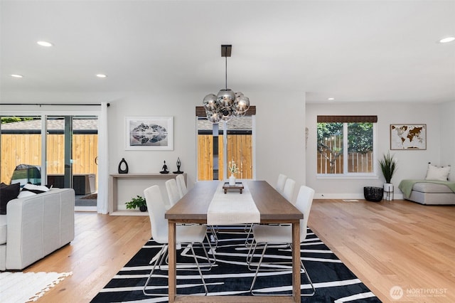 18114 NE 23rd St, Redmond, WA 98052 - dining room with wood finished floors, recessed lighting, and a chandelier