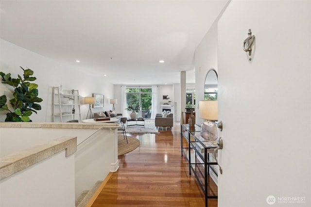 2551 Thorndyke Ave W Unit 203, Seattle, WA 98199 - hallway featuring light wood-style floors and recessed lighting