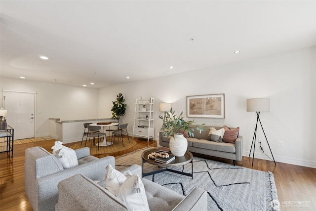 2551 Thorndyke Ave W Unit 203, Seattle, WA 98199 - living room with wood finished floors and recessed lighting