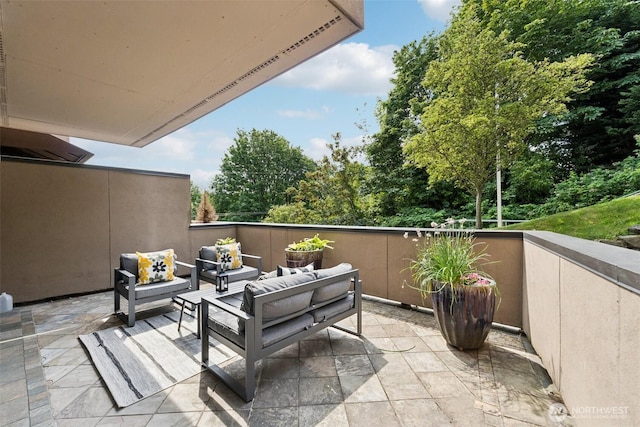 2551 Thorndyke Ave W Unit 203, Seattle, WA 98199 - balcony with an outdoor living space