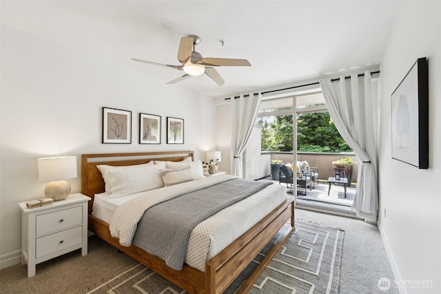 2551 Thorndyke Ave W Unit 203, Seattle, WA 98199 - bedroom featuring access to exterior, carpet flooring, and ceiling fan