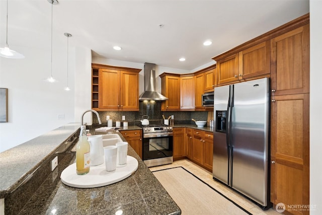 2551 Thorndyke Ave W Unit 203, Seattle, WA 98199 - kitchen featuring stainless steel appliances, wall chimney exhaust hood, brown cabinets, backsplash, and recessed lighting