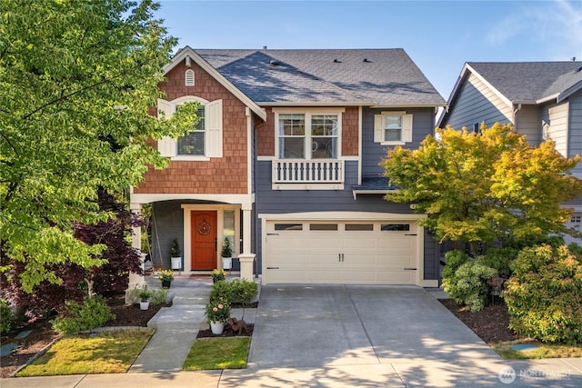 2211 56th St SE, Auburn, WA 98092 - view of front of house featuring driveway, an attached garage, and a shingled roof