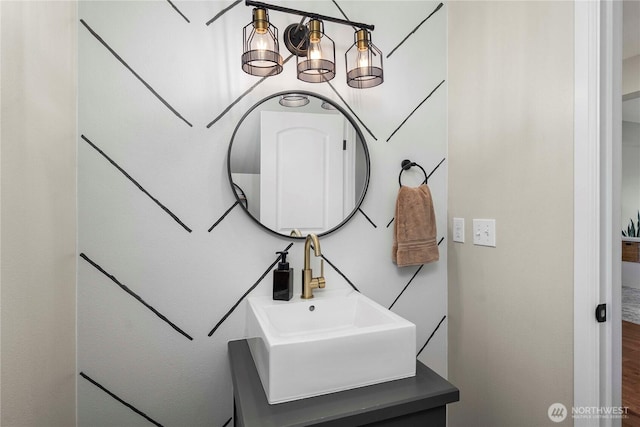 2211 56th St SE, Auburn, WA 98092 - bathroom with a chandelier, wood finished floors, and vanity