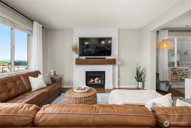 2211 56th St SE, Auburn, WA 98092 - living room with a large fireplace and wood finished floors