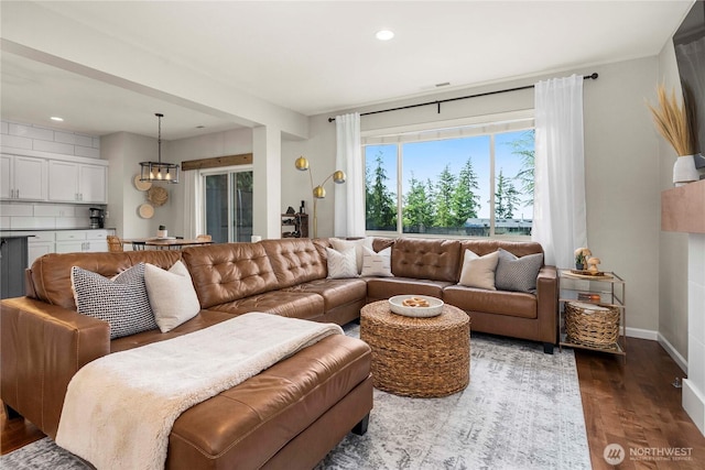 2211 56th St SE, Auburn, WA 98092 - living area featuring dark wood-style floors, recessed lighting, and a chandelier