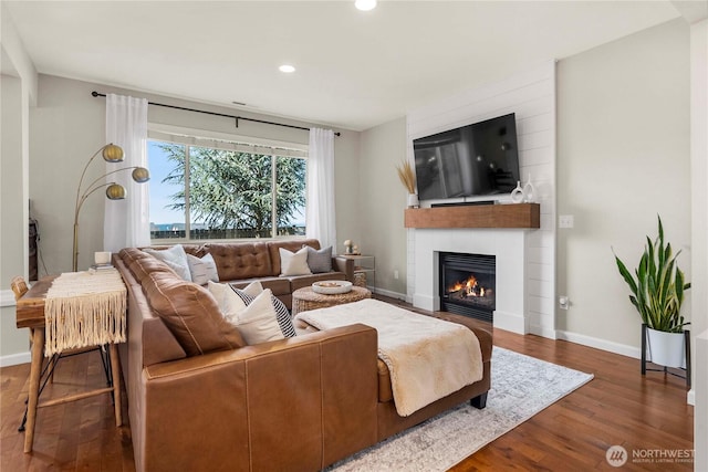 2211 56th St SE, Auburn, WA 98092 - living room featuring recessed lighting, a fireplace, and dark wood-type flooring